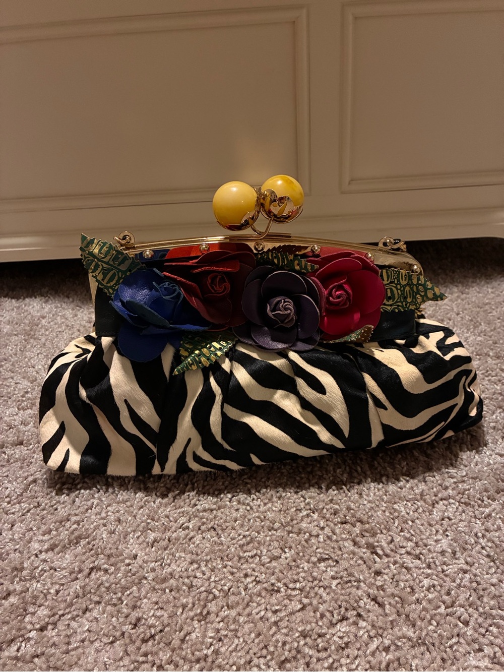 Sharif Zebra-Print Clutch with Multicolor Rose Embellishments